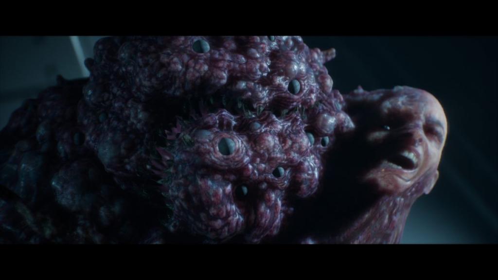 Close up of Growth with Eisele's head protruding out of it.