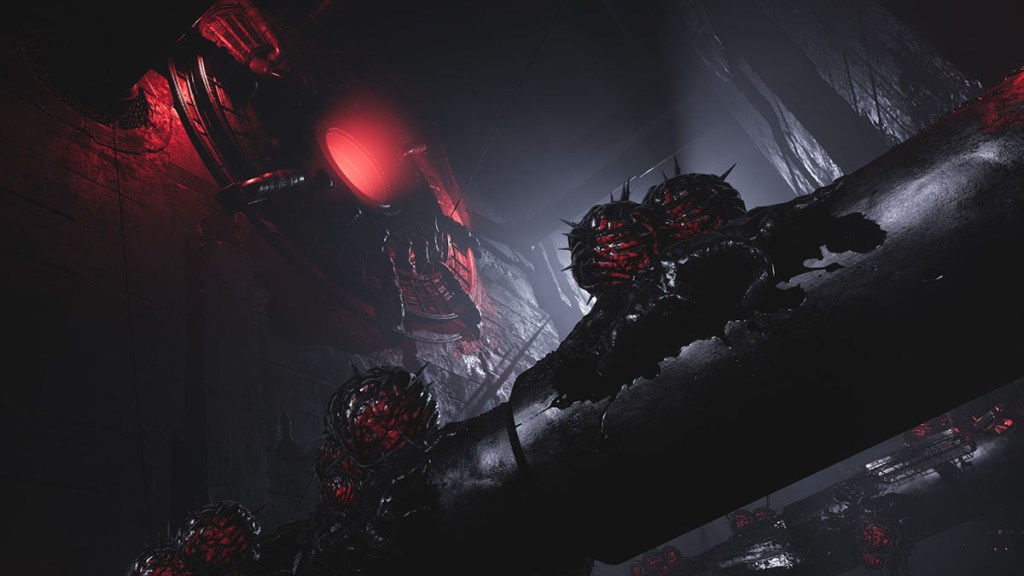 A dark and harrowing scene with black and red spiky orbs and a glowing red light in the background.