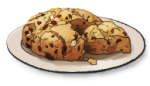 a plate of loaves with dark brown bits scattered inside