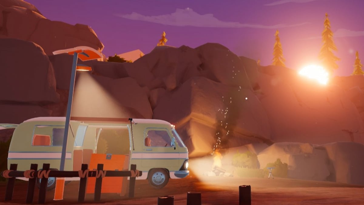 A van in outbound parked at camp during sunset