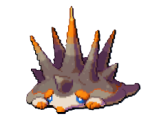 A brown, beige, and orange creature with a bunch of spikes coming out of its back