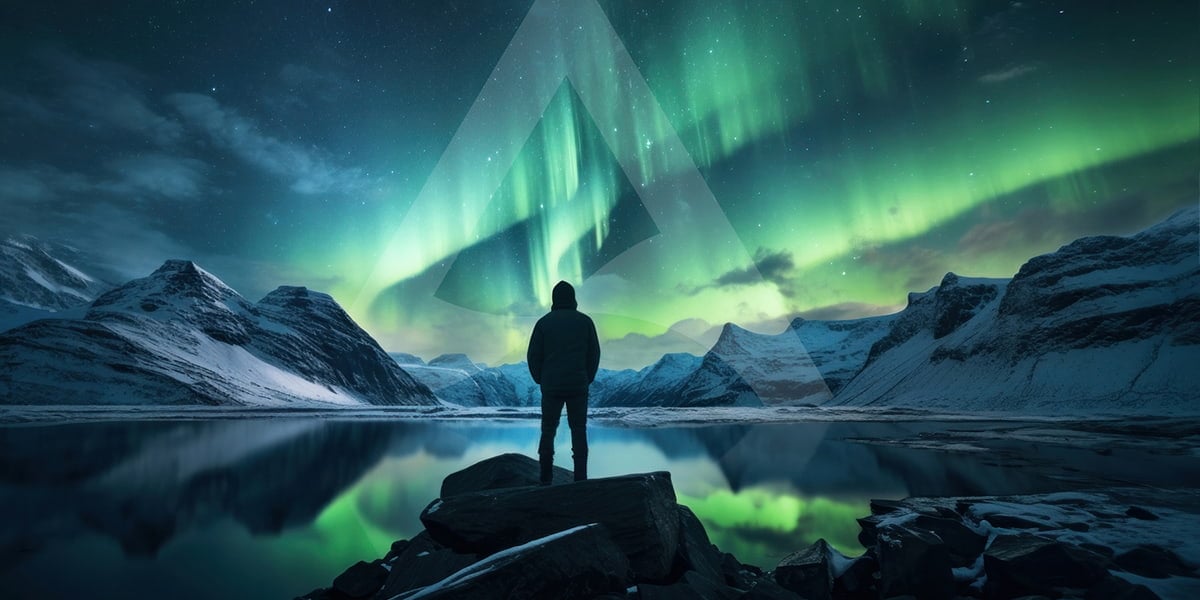 A man stands in front of a glacial landscape with the Arctic logo visible faintly in the background.
