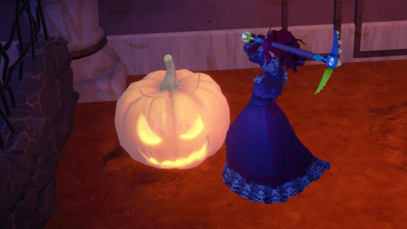 Swinging at pumpkin in Disney Dreamlight Valley